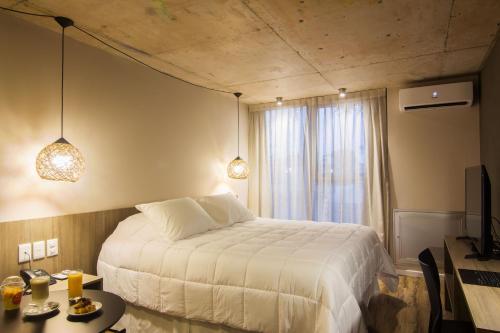 Hotel Ciudadano Suites - Tap to explore photos