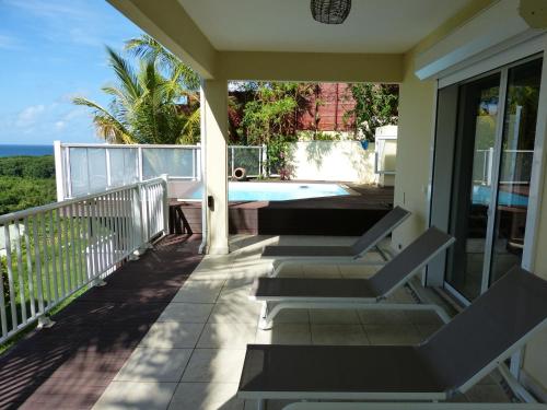 ระเบียง/ชานเรือน, Villa Nature & Villa Alizés (Villa Nature & Villa Alizes) in แซ็ง-เฟลิกซ์