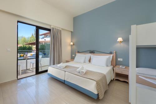 Matoula Beach Hotel Room Type - Family Room (2 Adults + 2 Children) Matoula Beach Hotel Room Type - Family Room (2 Adults + 2 Children)