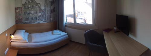 Landgasthof Hirschen in โฮเอเนมส์