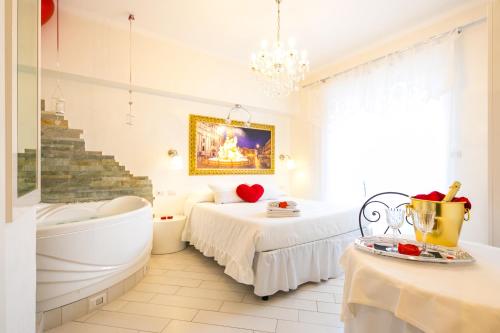 Suites Roma Tiburtina Located in Rome East, Suites Roma Tiburtina is a perfect starting point from which to explore Rome. The hotel offers a high standard of service and amenities to suit the individual needs of all travel