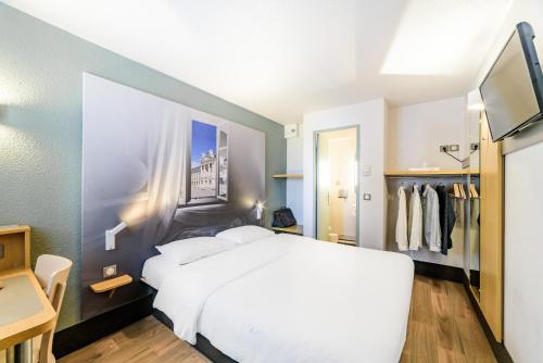 B&B Hotel DIJON Marsannay B&B Hôtel DIJON Marsannay is conveniently located in the popular Marsannay-la-Cote area. Offering a variety of facilities and services, the property provides all you need for a good nights sleep. Se