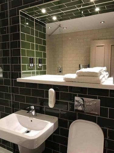 Ванна кімната, The George Hotel in Брекон