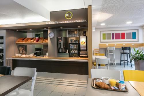 Restaurant, B&B HOTEL Toulouse Cite de l'Espace Mouchotte in Montaudran-Lespinet