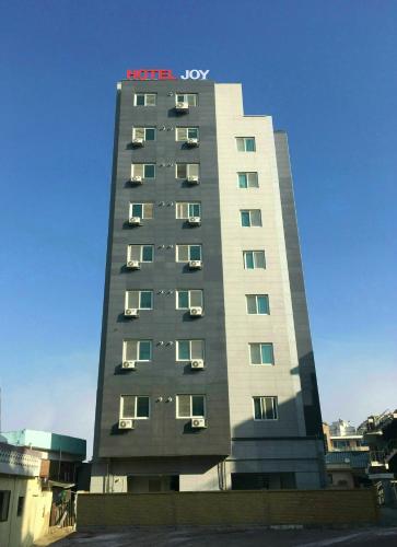 Hotel Joy near Camp Humphres - Tap to explore photos