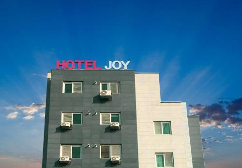 Hotel Joy near Camp Humphres Room Type - Suite