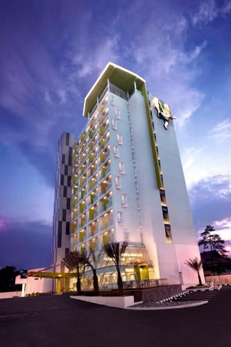 a large building with a large clock on top of it, Shakti Hotel Bandung in Bandung