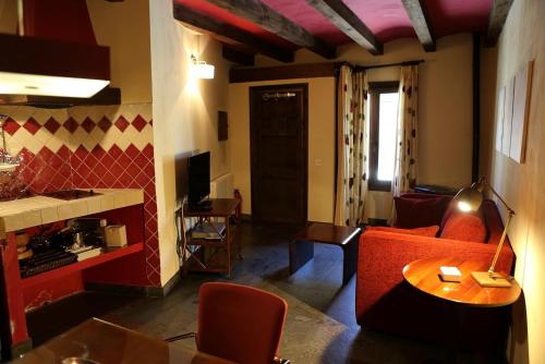 Koplietošanas atpūtas telpa ar TV, Estrella rural casa rural en la Sierra de Madrid in Braojos