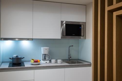 King's Blue, Urban Suites 4