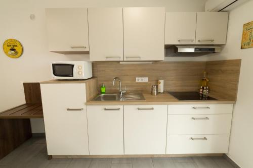 virtuve, Apartma Mariposa Banovci in Banovci