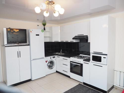 virtuve, Prime Time Guest House in Kant