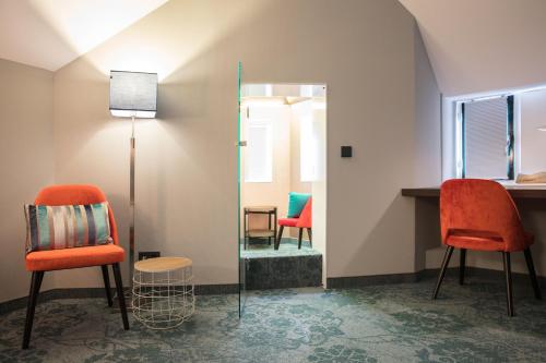 Shared lounge/TV area, Hotel de Koppelpaarden in Lichtenvoorde
