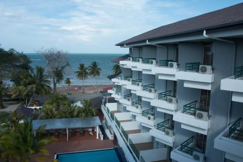 Akar Beach Resort - Tap to explore photos