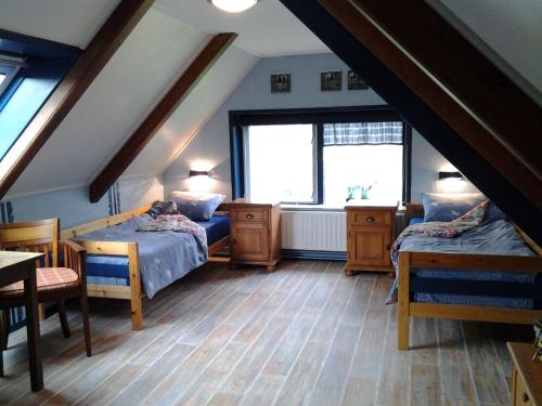 Bed & Breakfast “ Gastvrij onthaal “ in Een-West