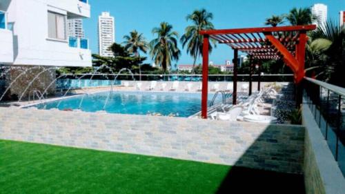 Swimming pool, Apartamento Playero in El Laguito