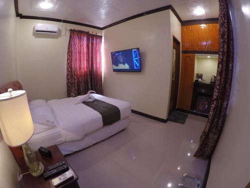 The Executive Villa Inn & Suites Room Type - Superior Queen Room