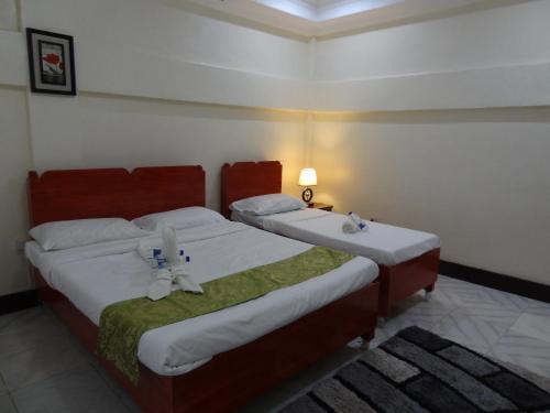 The Executive Villa Inn & Suites Room Type - Deluxe Family Room
