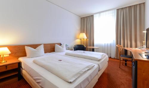 NOVINA HOTEL Südwestpark - main image
