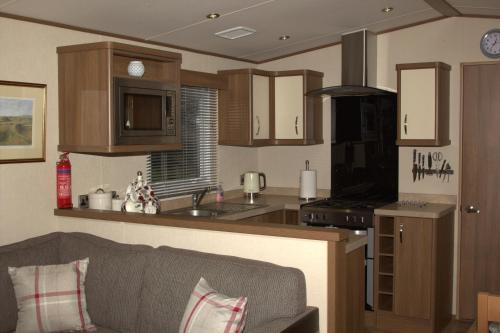 Фотография номера гостевого дома 25 Pitgrudy Holiday Park