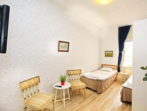 Rut & Ragnars Vandrarhem Room Type - Twin Room with Shared Bathroom