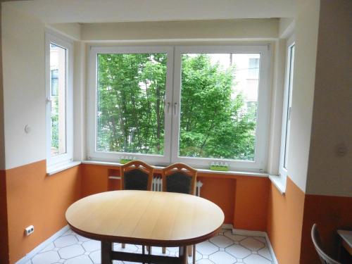 Felles stue/TV-område, Gastehaus Grupello in Düsseldorf