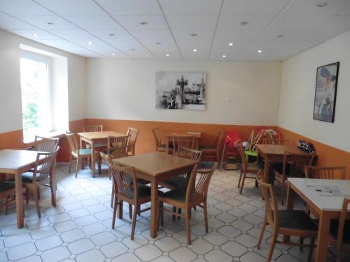 Felles stue/TV-område, Gastehaus Grupello in Düsseldorf