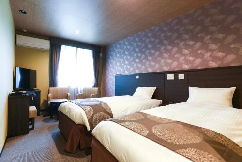 Half board included - Deluxe Twin Room with Extra Bed - Non-Smoking