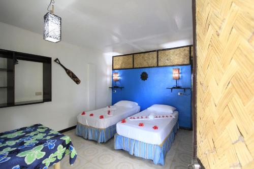 Discovery Island Resort Room Type - Native Island Cottage - Fan Room with Free Round Trip Boat Transfers from Lualhati Park