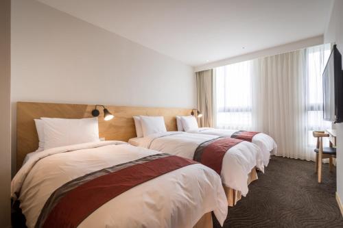 Triple Room with City View room in Green World NanGang