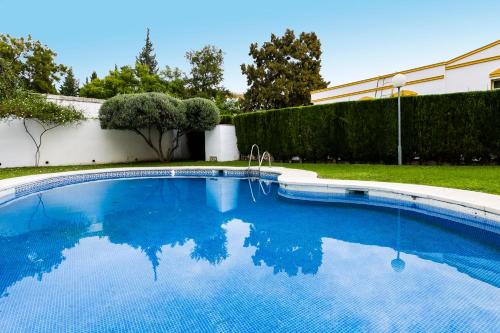 Swimmingpool, weforyou Real Del Tivoli Two Rooms in Arroyo de La Miel