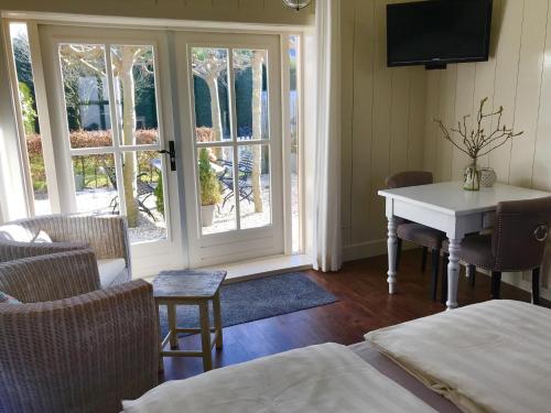 Instalaciones, Het Koetshuis in Kamperland