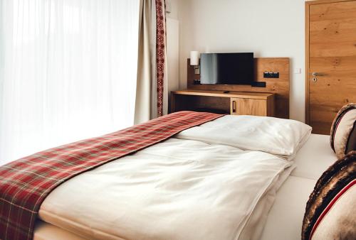 Hotel Edita Hotel Edita is conveniently located in the popular Scheidegg area. The property offers a high standard of service and amenities to suit the individual needs of all travelers. Service-minded staff will