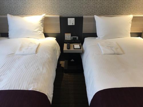 Economy Twin Room - Smoking image 3