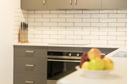 ห้องครัว, Ulverstone Waterfront Apartments in อัลเวอร์สโตน