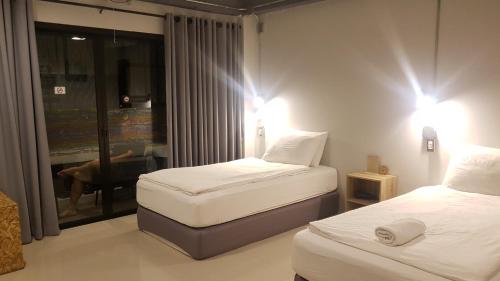 Twin room, shared bathroom, balcony