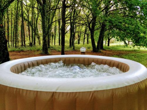 Luxury Safari Tent with Hot Tub at Camping La Fortinerie