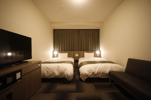 Standard Twin Room room in Dormy Inn Korakuen