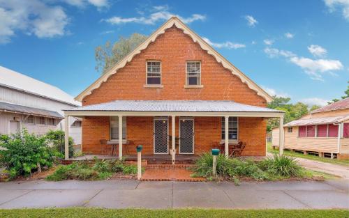 Eliza 1875 Red Brick Duplex Townhouse