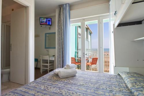 Family Room (2 Adults + 2 Children) with Balcony and Lateral Sea View