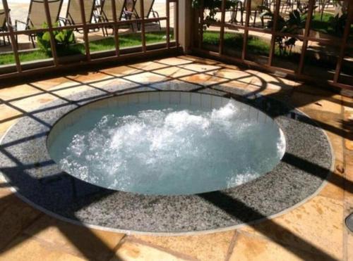 Swimming pool, Apto Lacqua Di Roma near Cafe Brasil Panificadora e Lanchonete