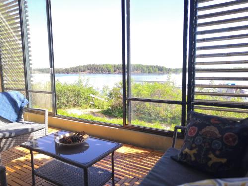 발코니/테라스, Apartment with sauna near the Saimaa lake in 라핀란타