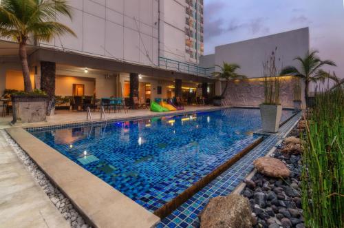 Swimming pool, The Square Surabaya Hotel near Suroboyo Carnival Park