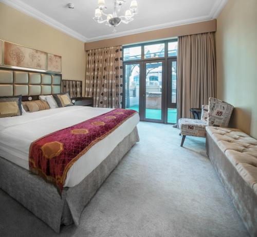 Downtown Al Bahar Apartments Room Type - One-Bedroom Apartment plus Guest Room - City View