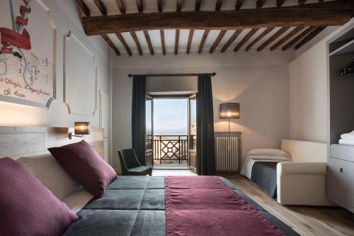 Вид, Hotel La Cisterna in Сан - Гіміньяно