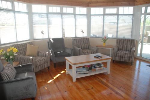 zonă comună salon/TV, Tuskar House by the Sea in Rosslare Harbour
