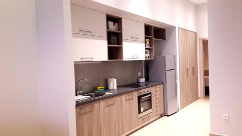 Kitchen, Casa Bella Deluxe Apartments in Pelekanos