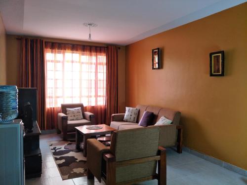 Bendra svetainė / televizorius, Annie's House in Mlolongo