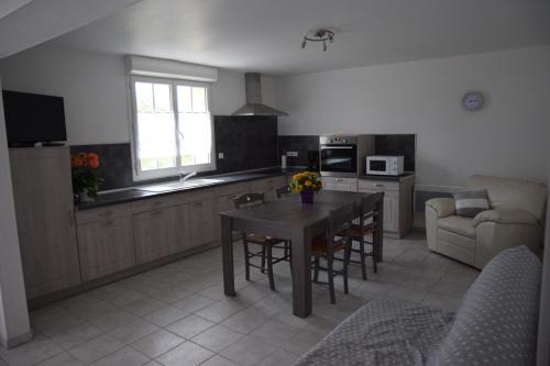 Koplietošanas atpūtas telpa ar TV, Chez Claude et Aline in Puynormand