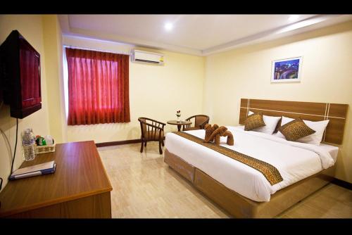 Iris Residence Pattaya Set in a prime location of Pattaya, Iris Residence Pattaya puts everything the city has to offer just outside your doorstep. Offering a variety of facilities and services, the property provides all yo