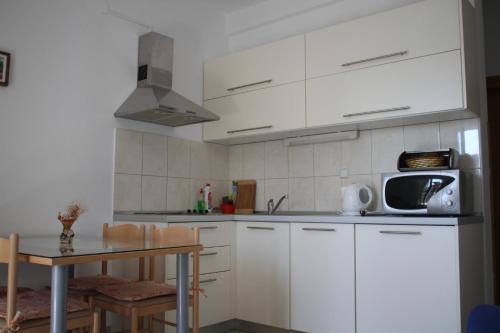 Two-Bedroom Apartment with Balcony and Sea View